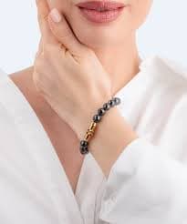 اسوارة من بوليس للنساء ذهبى مع خرز لون اسود